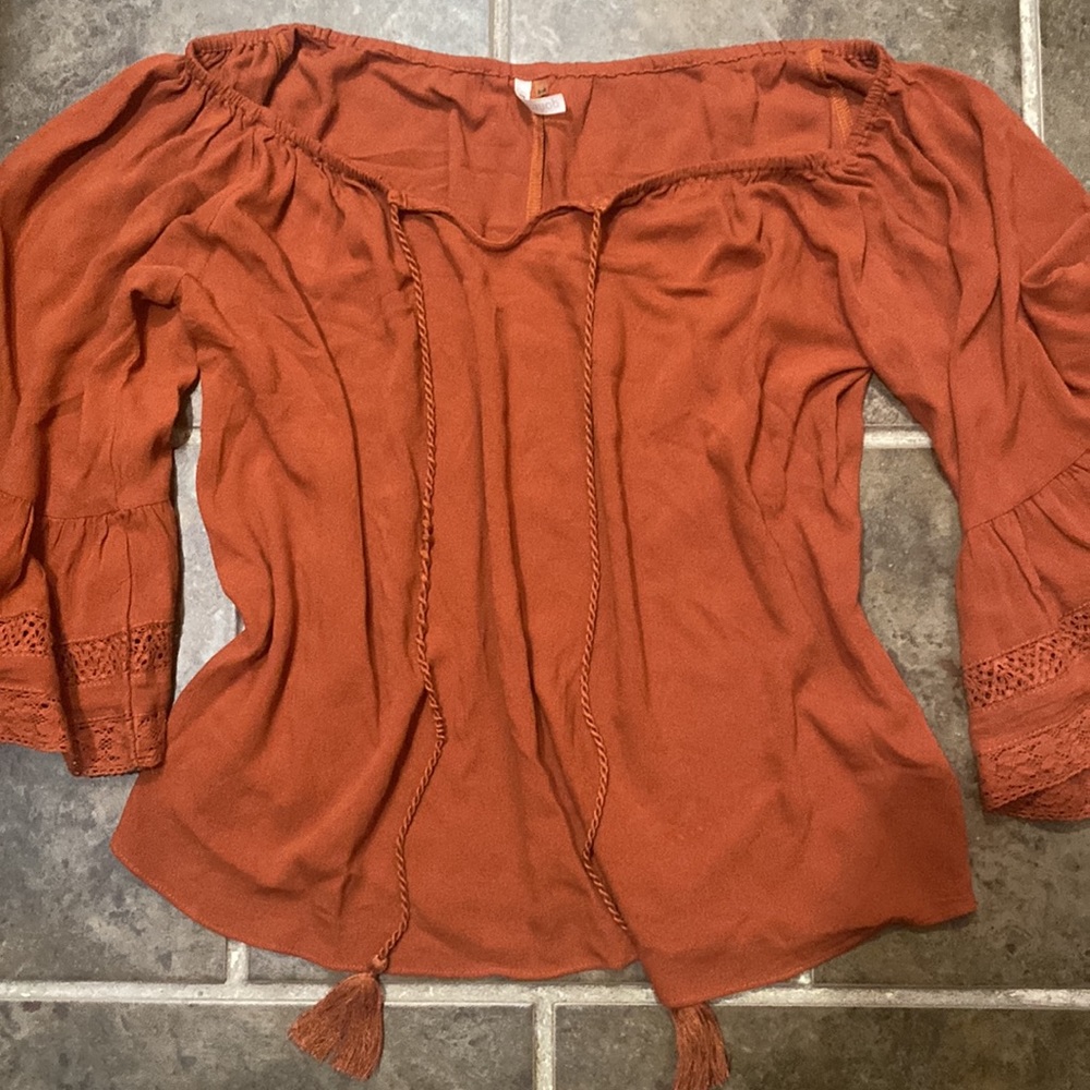 Rust colored blouse